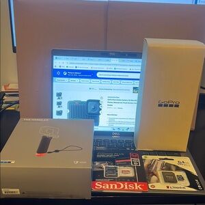 GoPro Hero Compact Action Camera Bundle with Hand Grip + Memory Card bundle